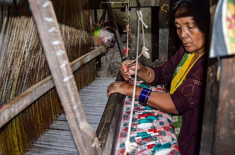 A women weaving Dhaka fabric at Tansen, Palpa